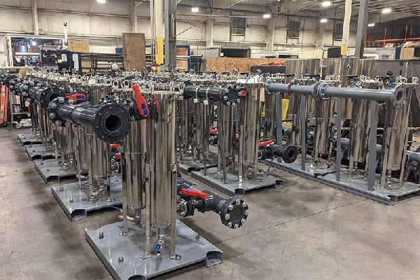 Bag filter housings in manufacturing facility