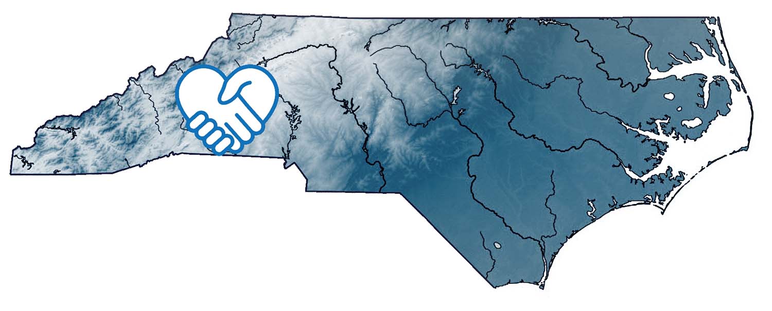 a relief map of North Carolina with crossed hands over western North Carolina